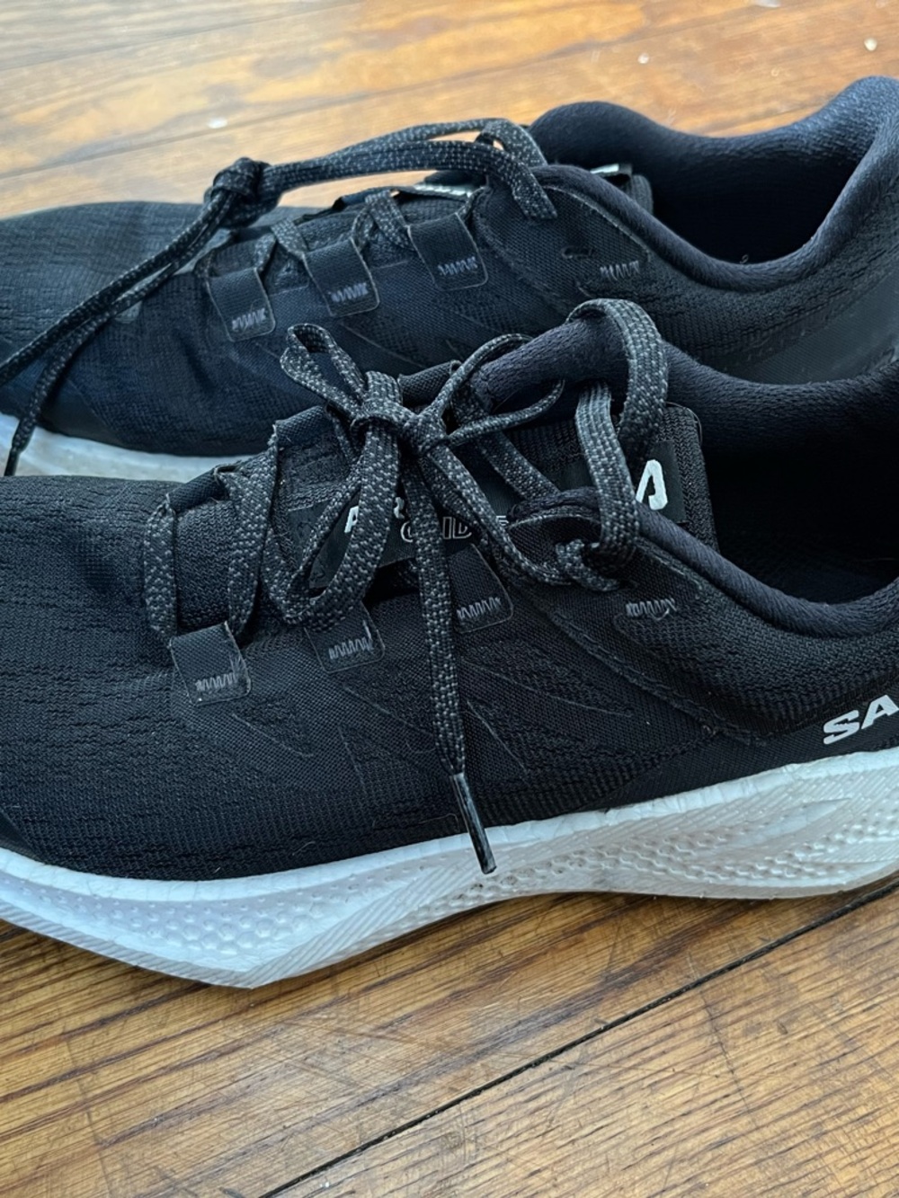 Salomon Black and White Low-Profile Running Sneakers